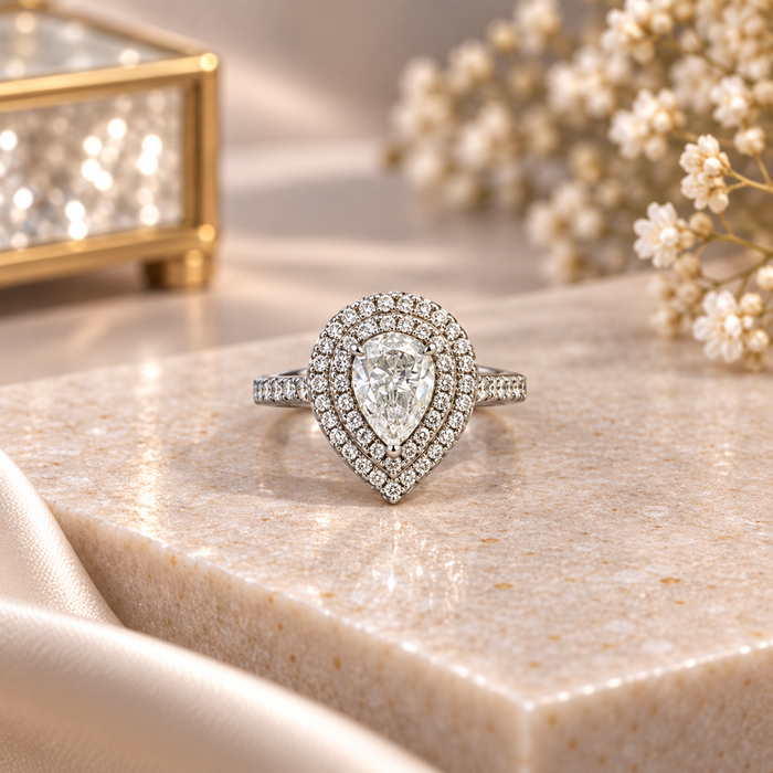 Elegant Teardrop Halo Silver Ring