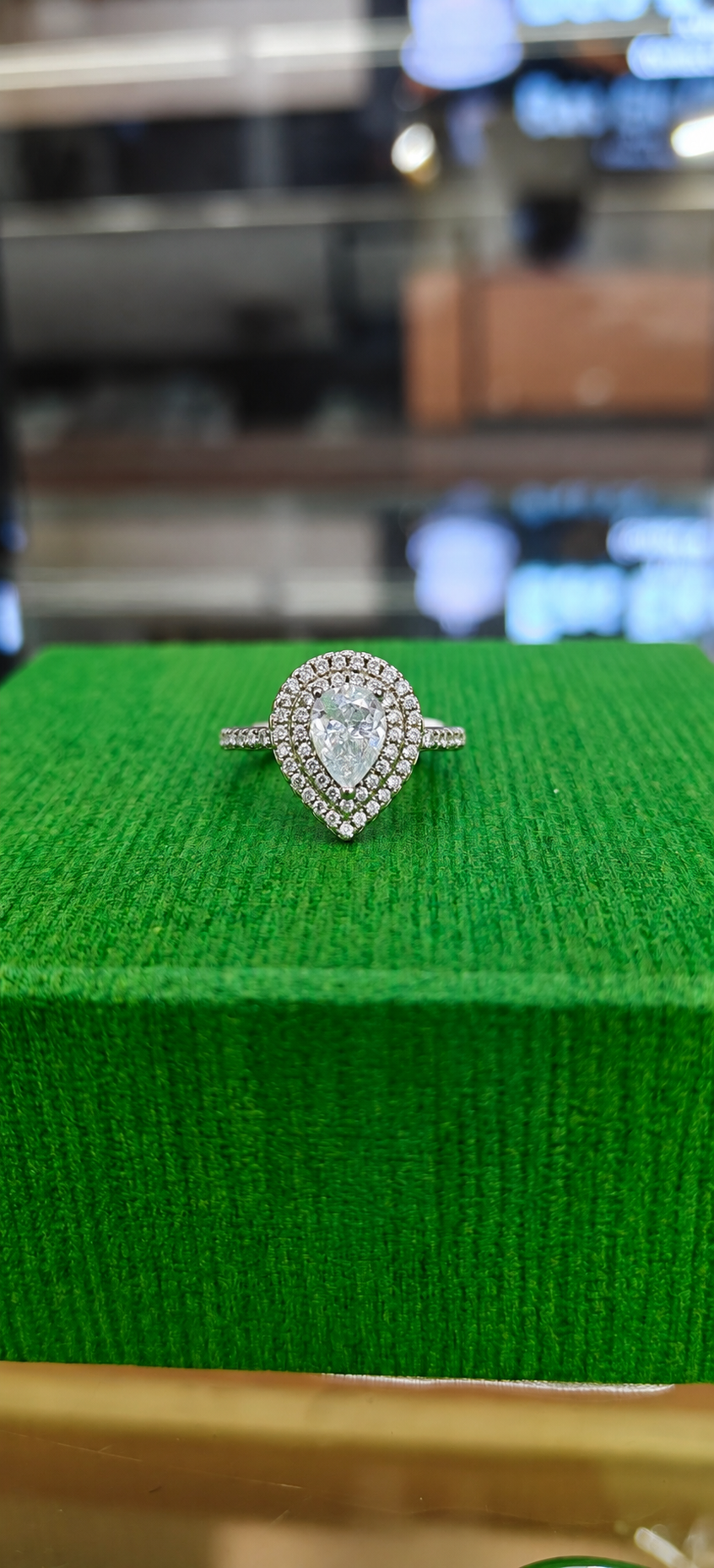 Elegant Teardrop Halo Silver Ring